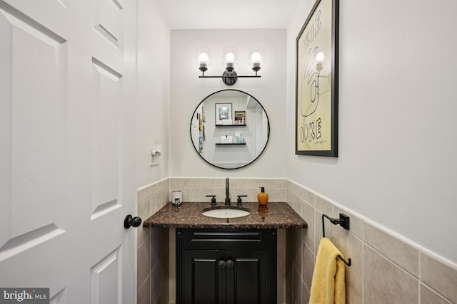 330 W George St, Philadelphia, PA 19123 - half bath with vanity, tile walls, and a wainscoted wall