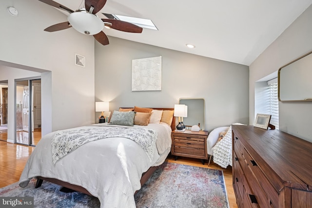 330 W George St, Philadelphia, PA 19123 - bedroom with vaulted ceiling, light wood-style flooring, a skylight, and ceiling fan