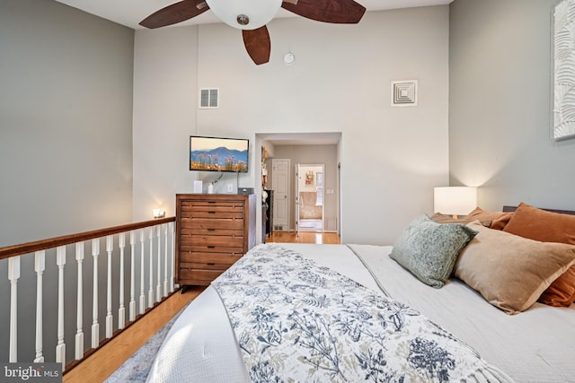 330 W George St, Philadelphia, PA 19123 - bedroom with wood finished floors, a high ceiling, and ceiling fan