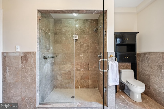 330 W George St, Philadelphia, PA 19123 - full bathroom featuring tile walls, a stall shower, and wainscoting