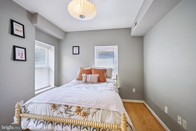 330 W George St, Philadelphia, PA 19123 - bedroom with multiple windows and light wood finished floors