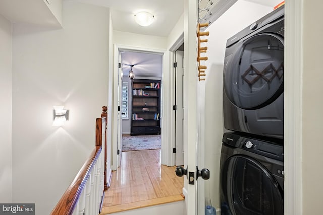 330 W George St, Philadelphia, PA 19123 - washroom with estacked washer and dryer and wood finished floors