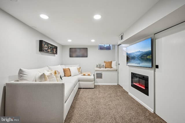 330 W George St, Philadelphia, PA 19123 - living room with carpet flooring, recessed lighting, and a glass covered fireplace