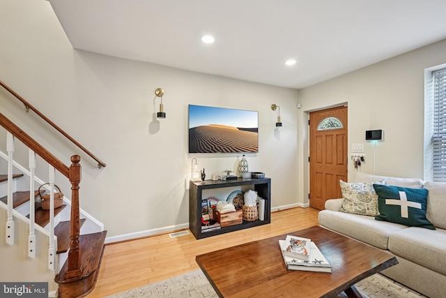 330 W George St, Philadelphia, PA 19123 - living area featuring wood finished floors, stairs, and recessed lighting