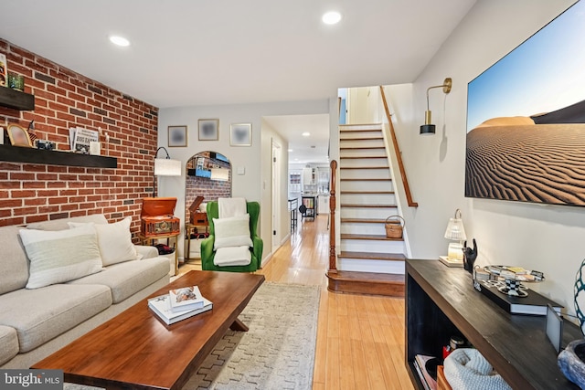 330 W George St, Philadelphia, PA 19123 - living area featuring stairway, light wood-style flooring, recessed lighting, and brick wall