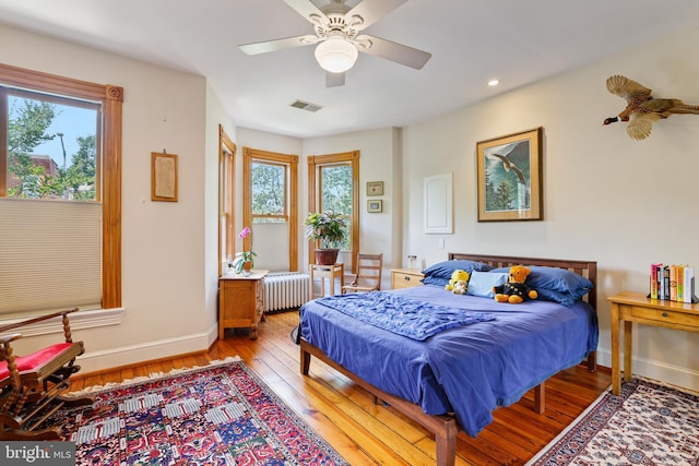 637 Constitution Ave NE, Washington, DC 20002 - bedroom featuring radiator, light wood-style floors, recessed lighting, and ceiling fan
