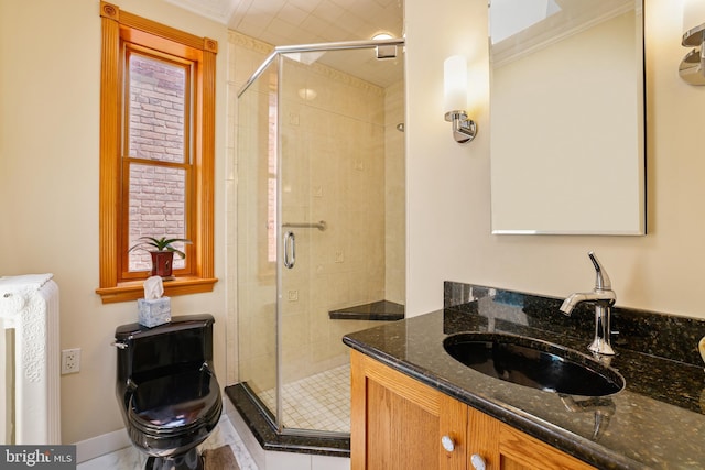637 Constitution Ave NE, Washington, DC 20002 - full bath featuring vanity, a stall shower, radiator, and ornamental molding