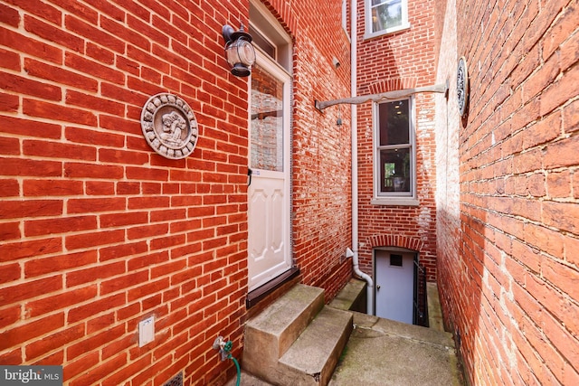 637 Constitution Ave NE, Washington, DC 20002 - doorway to property featuring brick siding