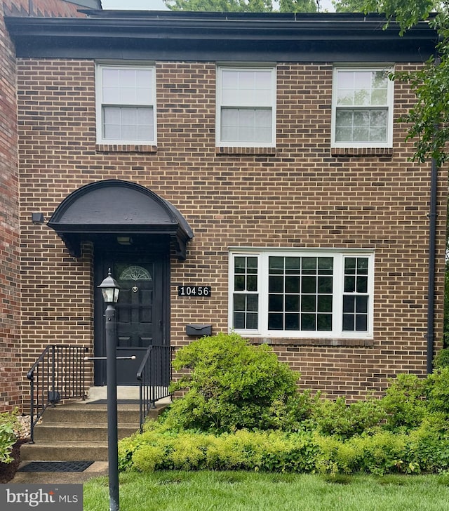10456 Armstrong St, Fairfax, VA 22030 - property entrance featuring brick siding