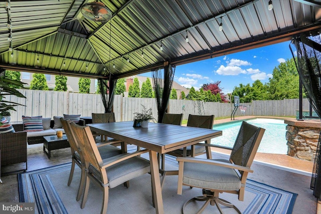 808 Redwood Ave, Reading, PA 19610 - fenced backyard with a gazebo, outdoor dining area, and a patio