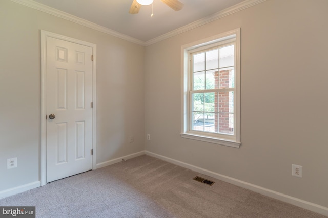 10311 Poe Dr, Manassas, VA 20110 - carpeted spare room featuring a ceiling fan and crown molding