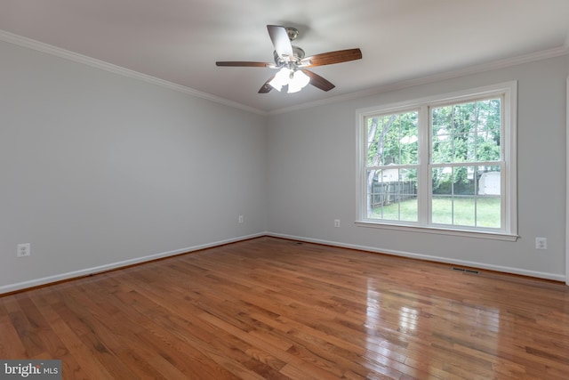 10311 Poe Dr, Manassas, VA 20110 - spare room featuring ceiling fan, wood finished floors, and crown molding