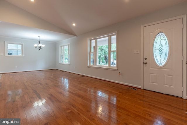 10311 Poe Dr, Manassas, VA 20110 - entrance foyer featuring a chandelier, lofted ceiling, hardwood / wood-style flooring, crown molding, and recessed lighting