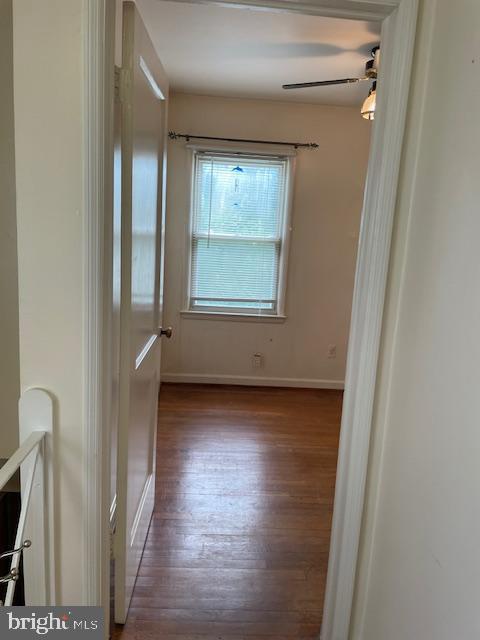 6813 10th Ave, Takoma Park, MD 20912 - empty room featuring wood finished floors and ceiling fan
