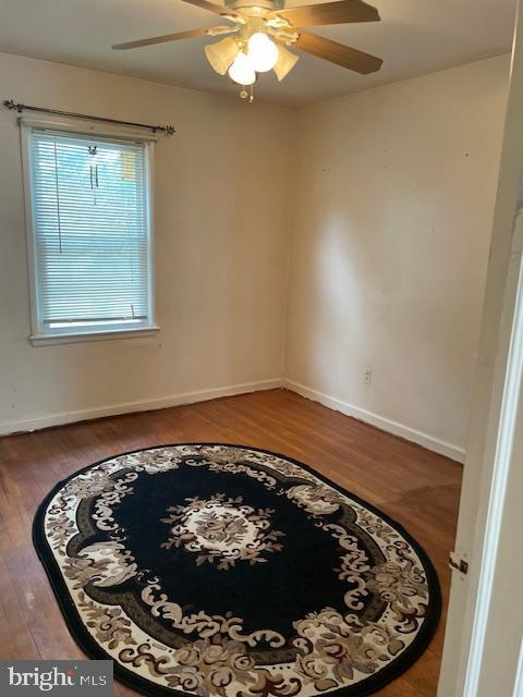 6813 10th Ave, Takoma Park, MD 20912 - spare room featuring wood finished floors and a ceiling fan