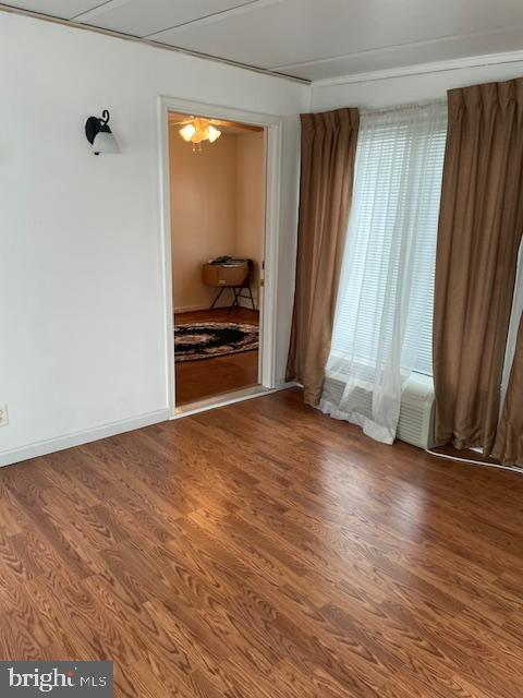 6813 10th Ave, Takoma Park, MD 20912 - empty room featuring wood finished floors