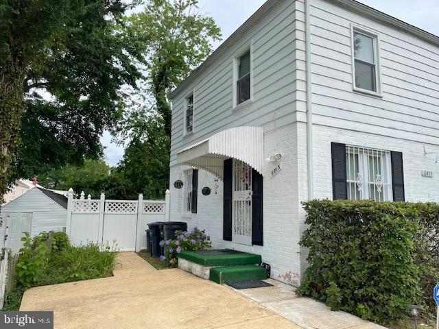 6813 10th Ave, Takoma Park, MD 20912 - view of front of home with brick siding