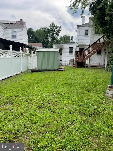 6813 10th Ave, Takoma Park, MD 20912 - view of yard featuring a storage unit and stairway