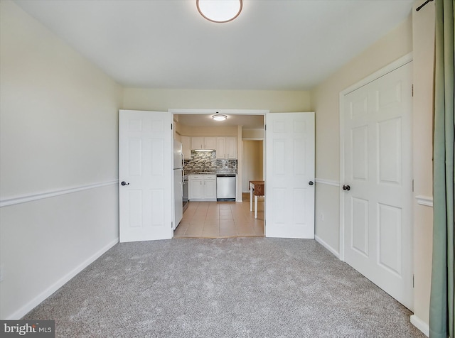 1042 Brinker Dr, Hagerstown, MD 21740 - unfurnished living room with light colored carpet and baseboards