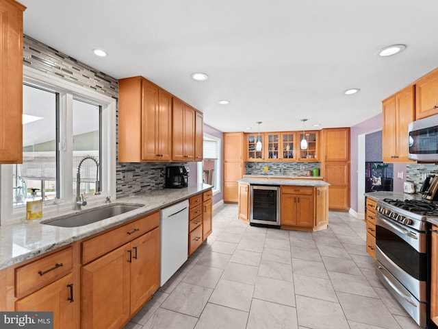 2505 Yellowstone Rd, Cinnaminson, NJ 08077 - kitchen with appliances with stainless steel finishes, beverage cooler, backsplash, glass insert cabinets, and light stone counters