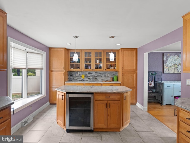 2505 Yellowstone Rd, Cinnaminson, NJ 08077 - kitchen with beverage cooler, backsplash, glass insert cabinets, recessed lighting, and a kitchen island