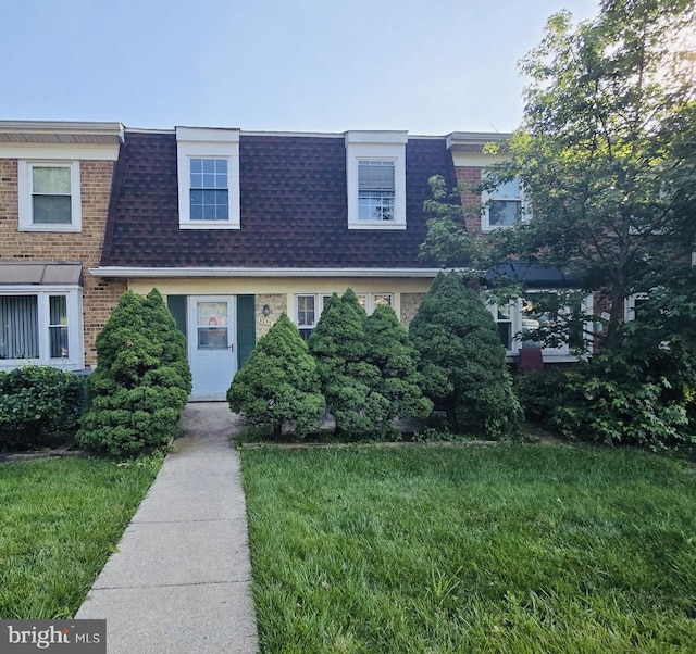 9090 Moonshine Holw Unit C, Laurel, MD 20723 - view of front of home featuring mansard roof, roof with shingles, a front yard, and brick siding