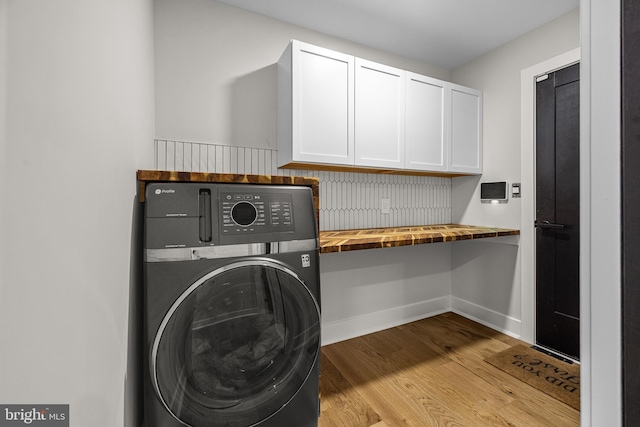 9 W Shore Ct, Landenberg, PA 19350 - laundry area featuring washer / dryer, light wood-style floors, cabinet space, and a desk