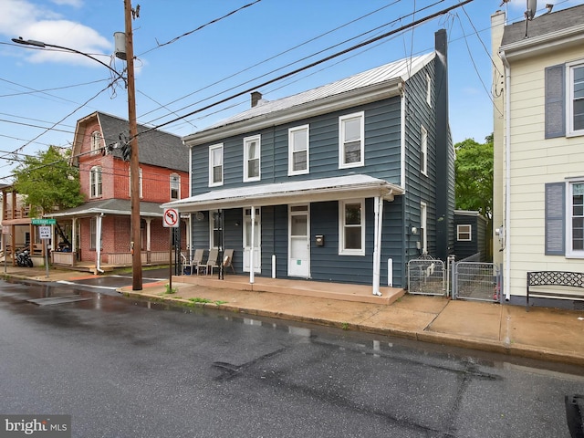 31 W Ferdinand St, Manheim, PA 17545 - multi unit property with a gate and covered porch