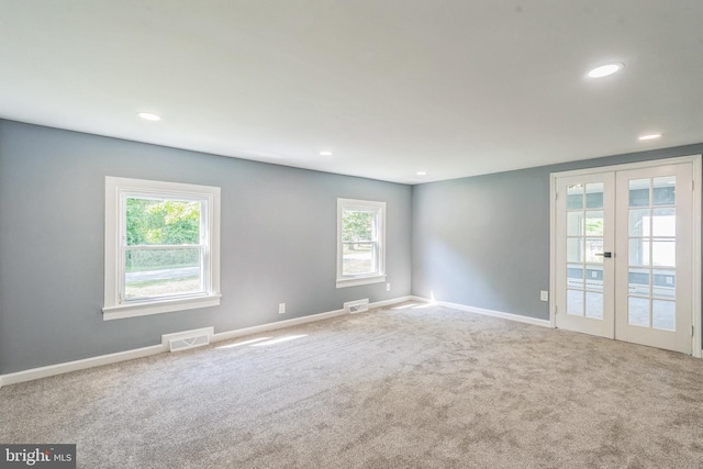 17 Sportsmans Rd, Carneys Point, NJ 08069 - carpeted spare room with french doors and recessed lighting