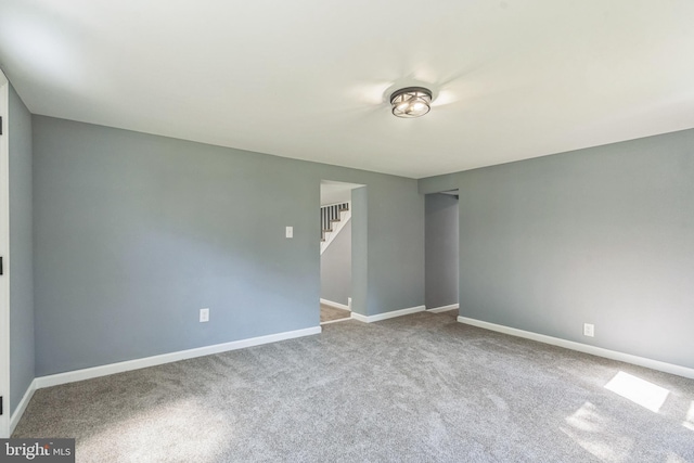 17 Sportsmans Rd, Carneys Point, NJ 08069 - empty room with stairs and carpet flooring