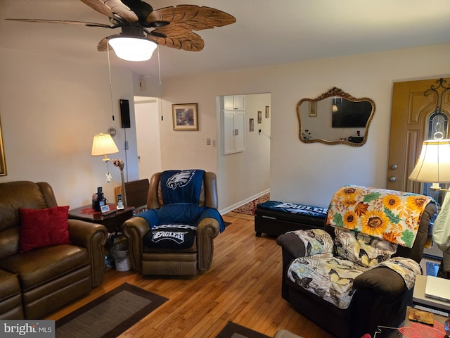 235 S Main St, Quakertown, PA 18951 - living area featuring wood finished floors, ceiling fan, and electric panel