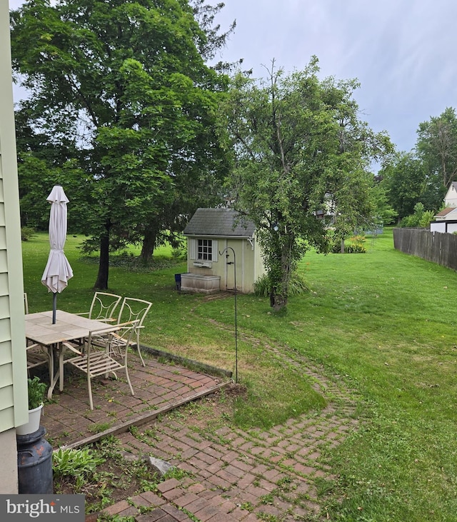 235 S Main St, Quakertown, PA 18951 - view of yard featuring a storage shed and a patio area