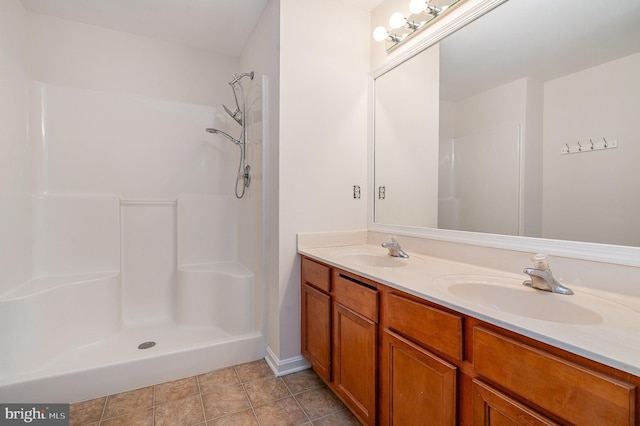 114 Dragoon Dr, Montross, VA 22520 - bathroom featuring double vanity and a shower