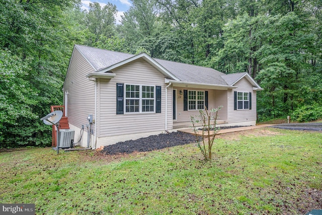 114 Dragoon Dr, Montross, VA 22520 - ranch-style home with a front yard, roof with shingles, and covered porch