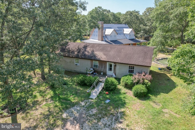 25036 Becks Ln, Georgetown, DE 19947 - view of front facade featuring a chimney, a front yard, roof with shingles, and view of wooded area