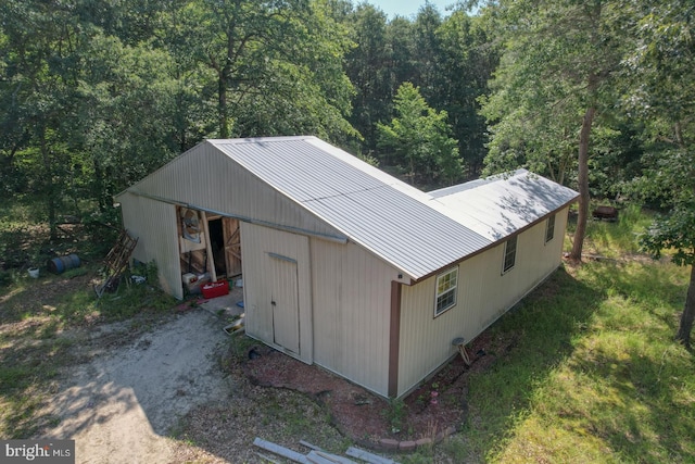 25036 Becks Ln, Georgetown, DE 19947 - view of outbuilding with a forest view