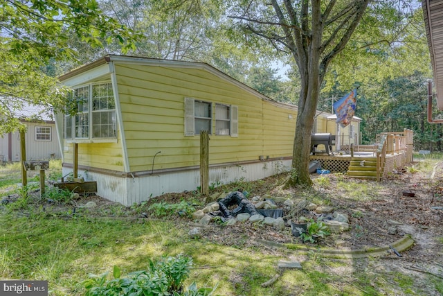 25036 Becks Ln, Georgetown, DE 19947 - view of side of home featuring a deck
