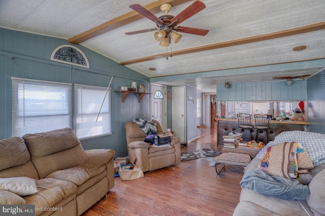 25036 Becks Ln, Georgetown, DE 19947 - living room featuring wood finished floors, a ceiling fan, and wooden walls