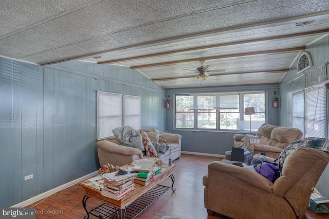 25036 Becks Ln, Georgetown, DE 19947 - living room with wood finished floors, ceiling fan, and wooden walls
