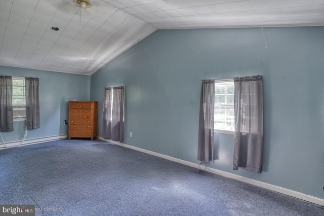 25036 Becks Ln, Georgetown, DE 19947 - carpeted spare room featuring vaulted ceiling and a baseboard heating unit