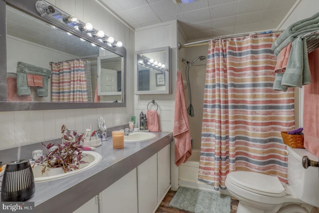 25036 Becks Ln, Georgetown, DE 19947 - full bath with shower / bath combo with shower curtain, double vanity, and wood finished floors
