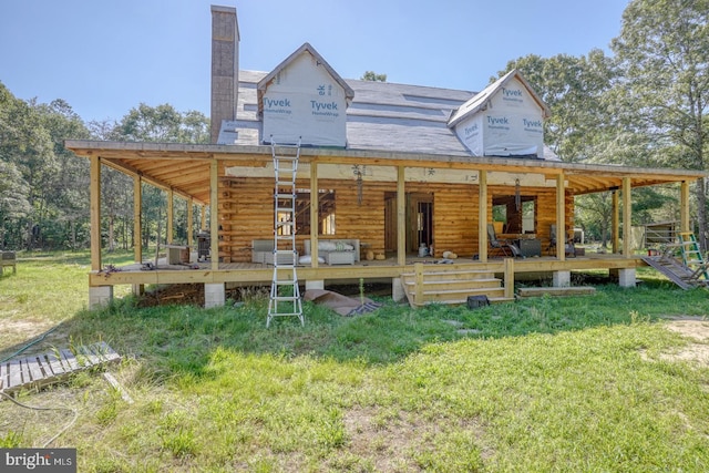 25036 Becks Ln, Georgetown, DE 19947 - back of property featuring a chimney, log exterior, and a wooden deck