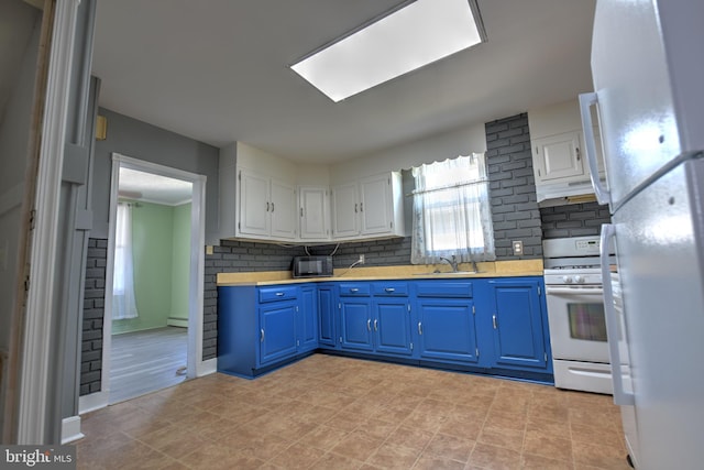 5417 Wasena Ave, Baltimore, MD 21225 - kitchen featuring white appliances, blue cabinetry, backsplash, and light countertops