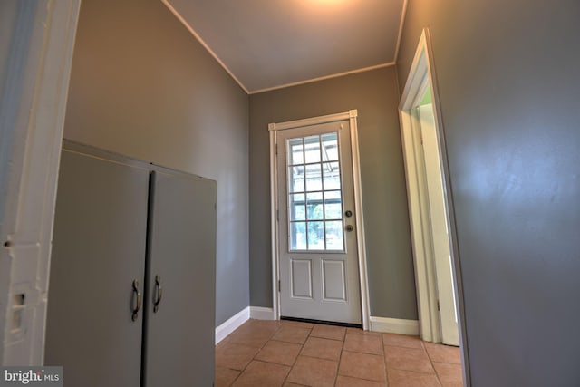 5417 Wasena Ave, Baltimore, MD 21225 - doorway to outside with light tile patterned floors and crown molding