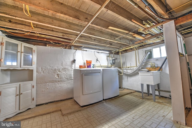 5417 Wasena Ave, Baltimore, MD 21225 - below grade area with separate washer and dryer and brick patterned floors