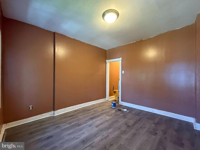 2424 Greenmount Ave, Baltimore, MD 21218 - unfurnished room with baseboards and wood finished floors