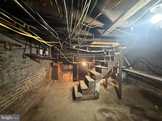 2424 Greenmount Ave, Baltimore, MD 21218 - unfinished below grade area with brick wall
