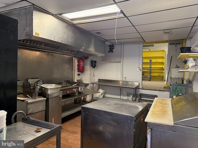 2424 Greenmount Ave, Baltimore, MD 21218 - kitchen with stainless steel countertops and a drop ceiling