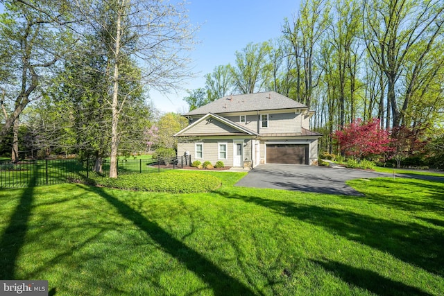 2022 Rockingham St, Mclean, VA 22101 - back of property featuring driveway, an attached garage, and stone siding
