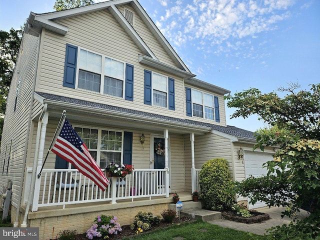 30 Archwood Ave, Glen Burnie, MD 21061 - view of front facade featuring a porch and an attached garage